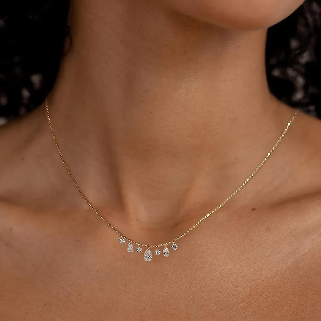 3 Pear and 4 Round Cut Graduated Floating Diamond Necklace