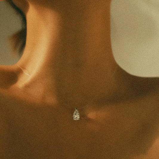 Invisible Chain Pear Cut Solitaire Diamond Pendant Necklace